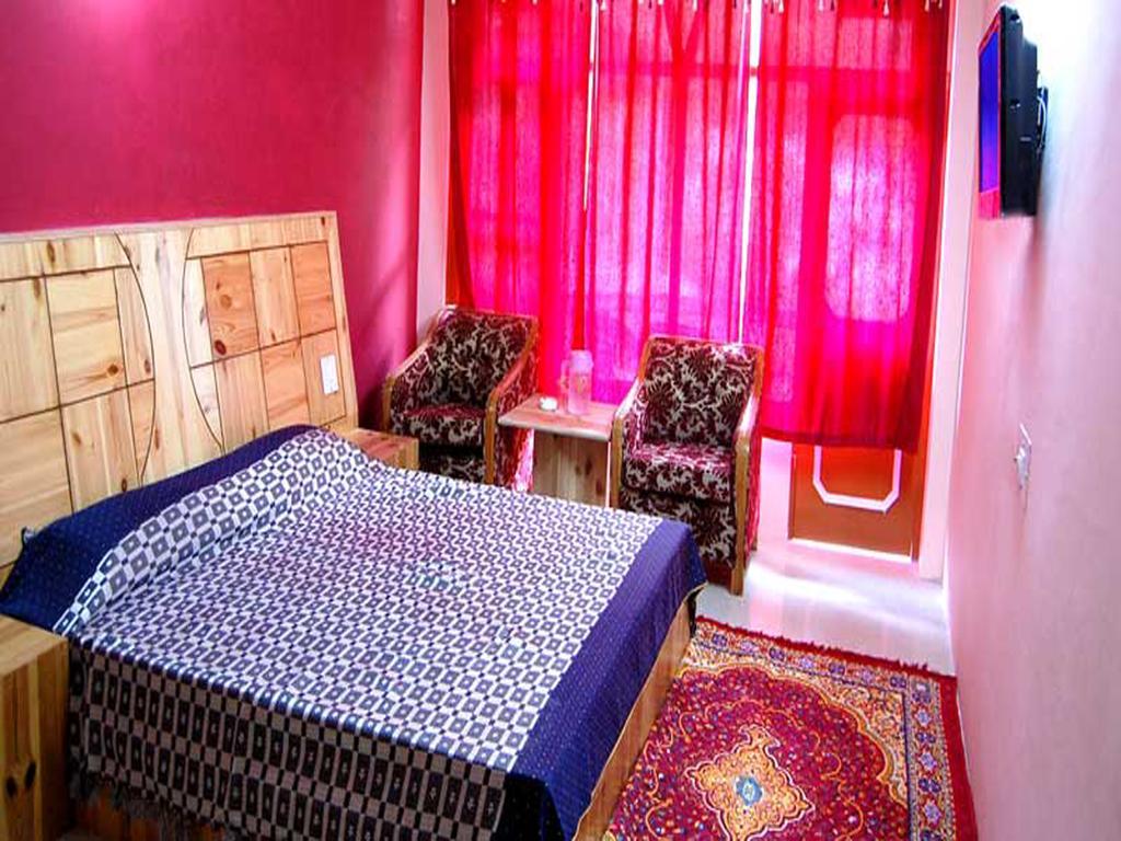Himanshu Resorts Manāli Pokoj fotografie