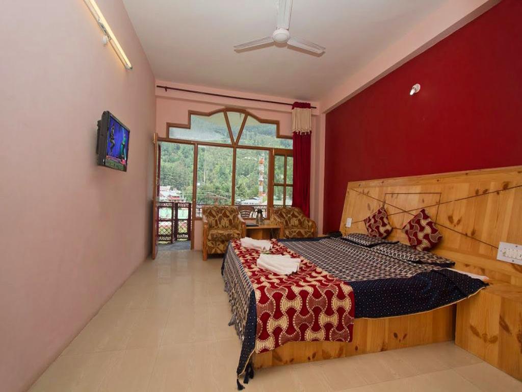 Himanshu Resorts Manāli Pokoj fotografie