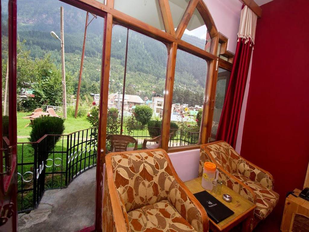 Himanshu Resorts Manāli Pokoj fotografie